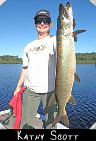 Kathy Scott with 35-inch musky guided by Phil Schweik
