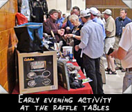 Early evening activity at the raffle tables