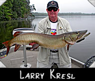 Larry Kresl with his 46-inch musky guided by John Farrow