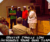 Greeter Janelle Lone introduces the Young Guns team
